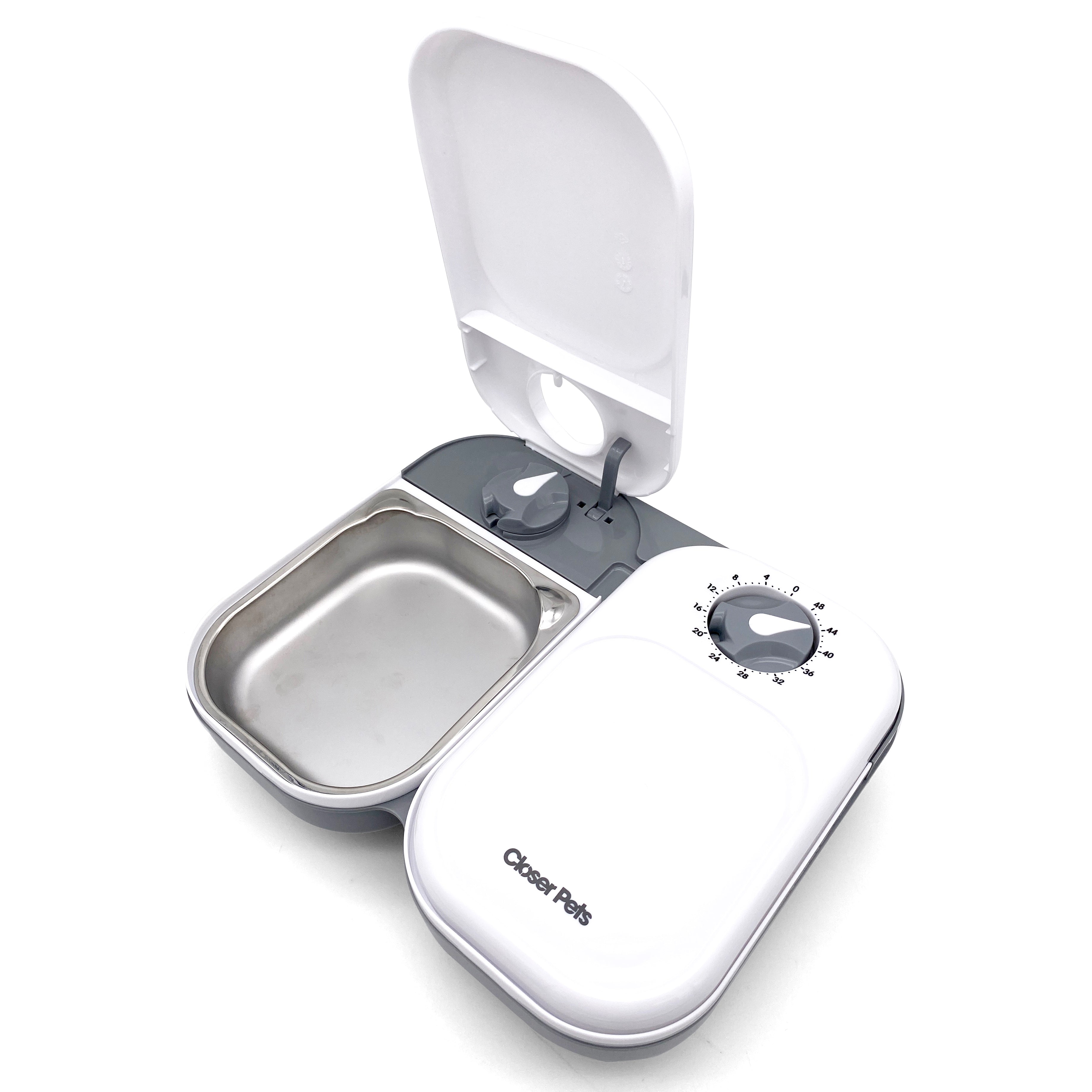 A two meal pet feeder for wet or dry food in white and grey with a timer and stainless steel inserts on a white background