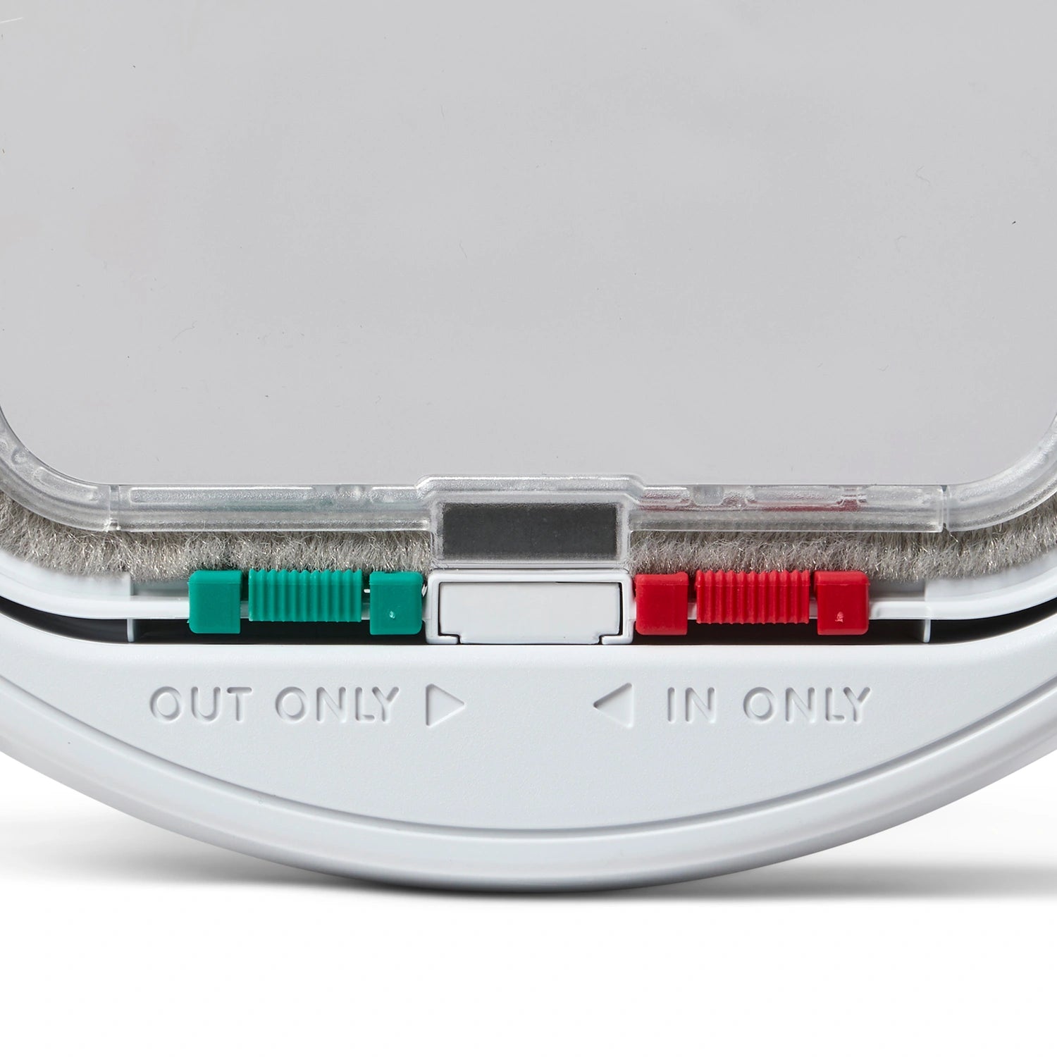 Close-up of electronic components with 'OUT ONLY' and 'IN ONLY' labels on a white background