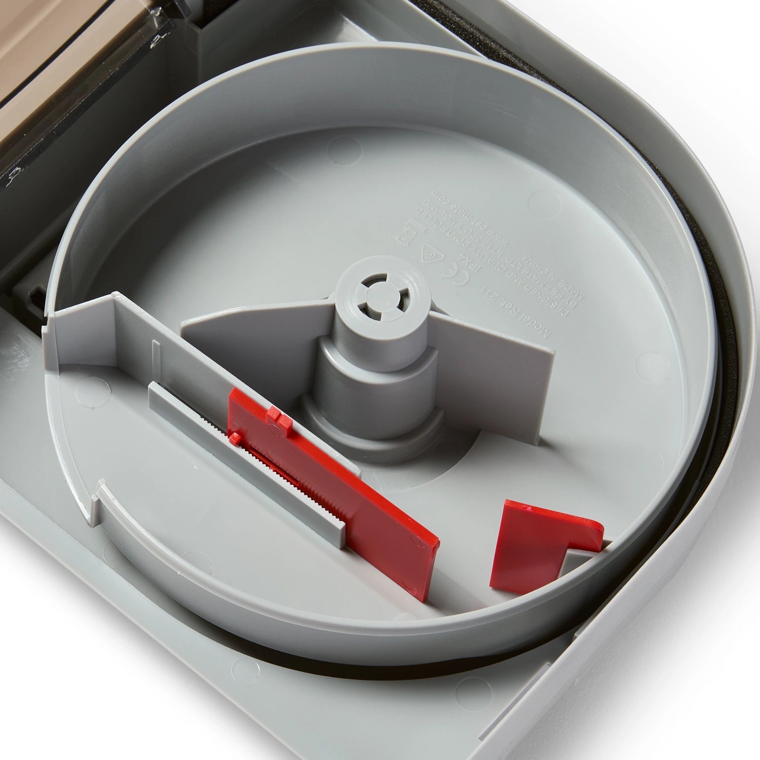 Close up view on the inside of the pond food feeder