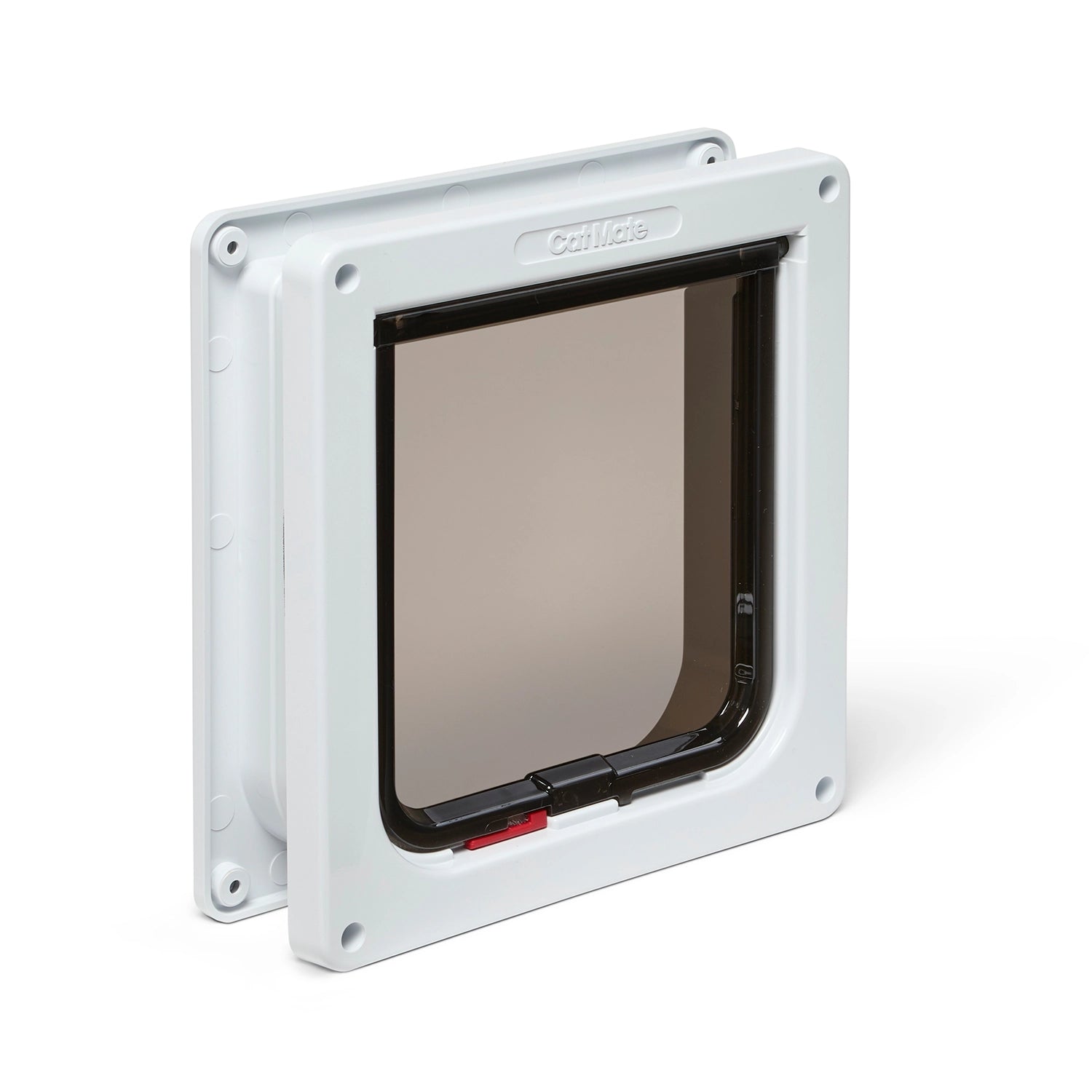 Cat door with a white frame and transparent flap on a white background
