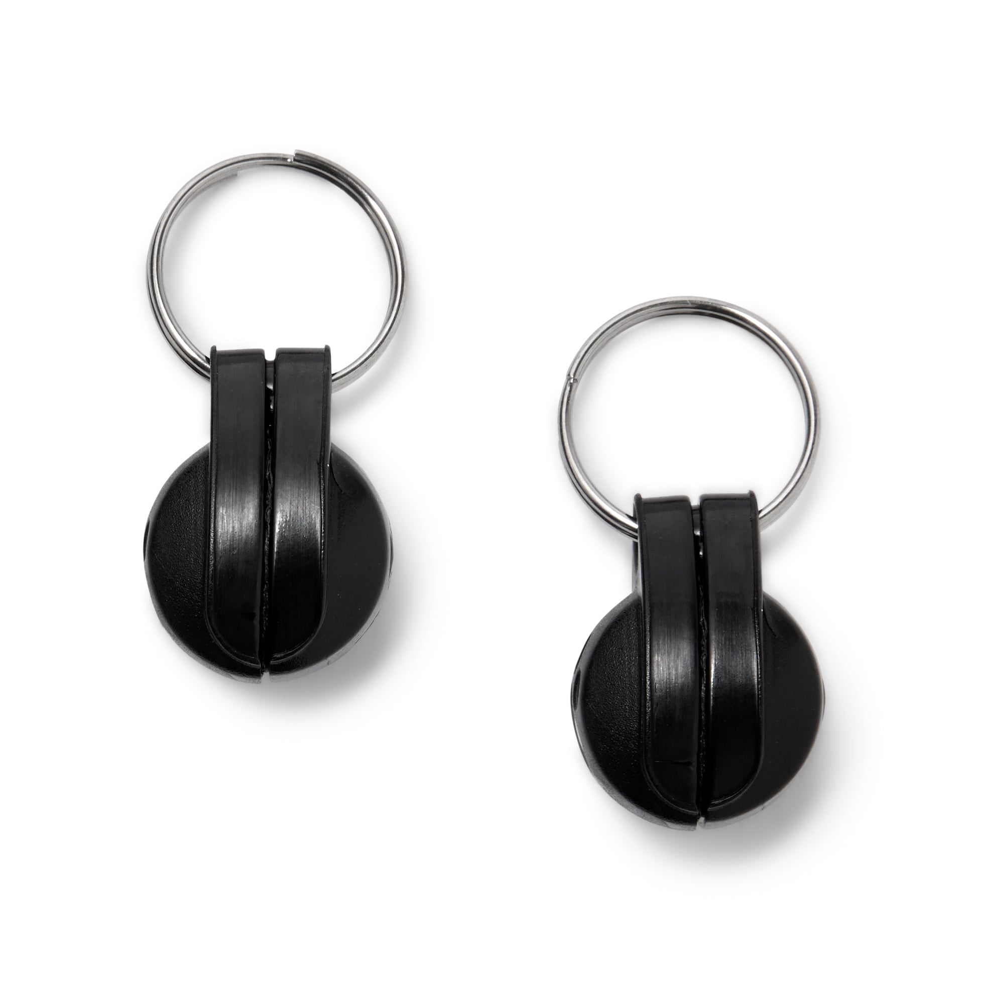 A side-on view of the black magnetic tags which display the raised area where the stickers would be wrapped over, on a white background