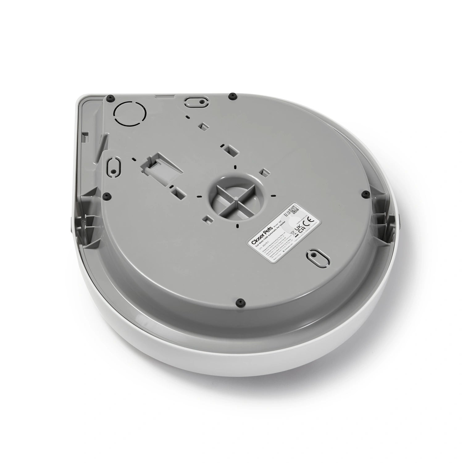 The underside of the grey base of the five meal feeder displaying manufacturer as 'Closer Pets'