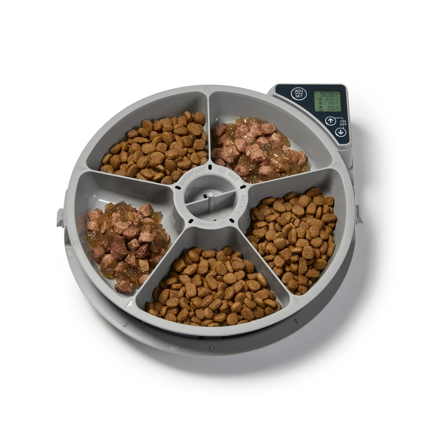 Grey Ppt food dispenser with five divided sections filled with portions of dry pet food and wet pet food on a white background