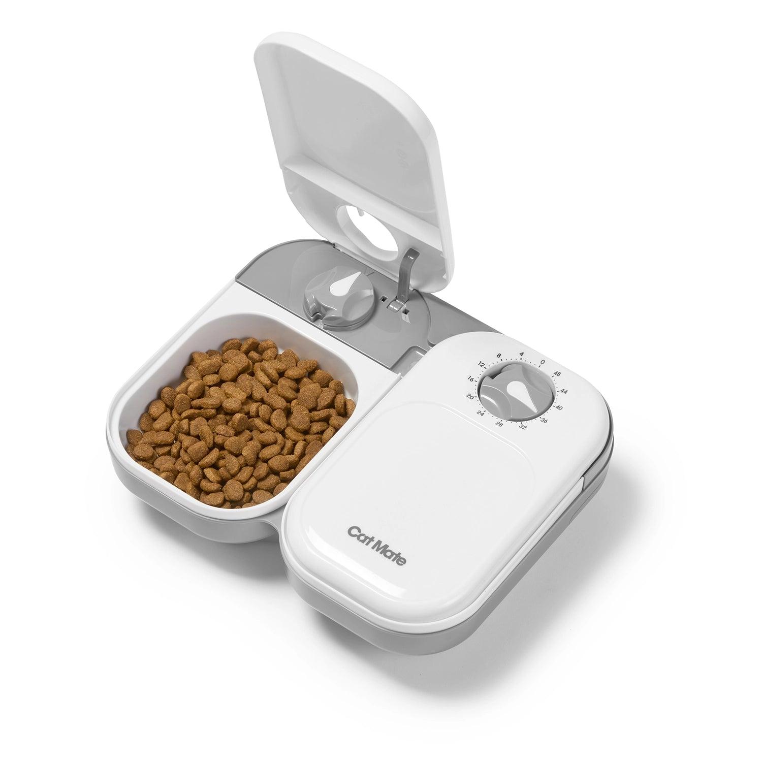 White and grey pet feeder showing one open bowl containing brown dry pet food and the adjacent food bowl with a closed lid on a white background