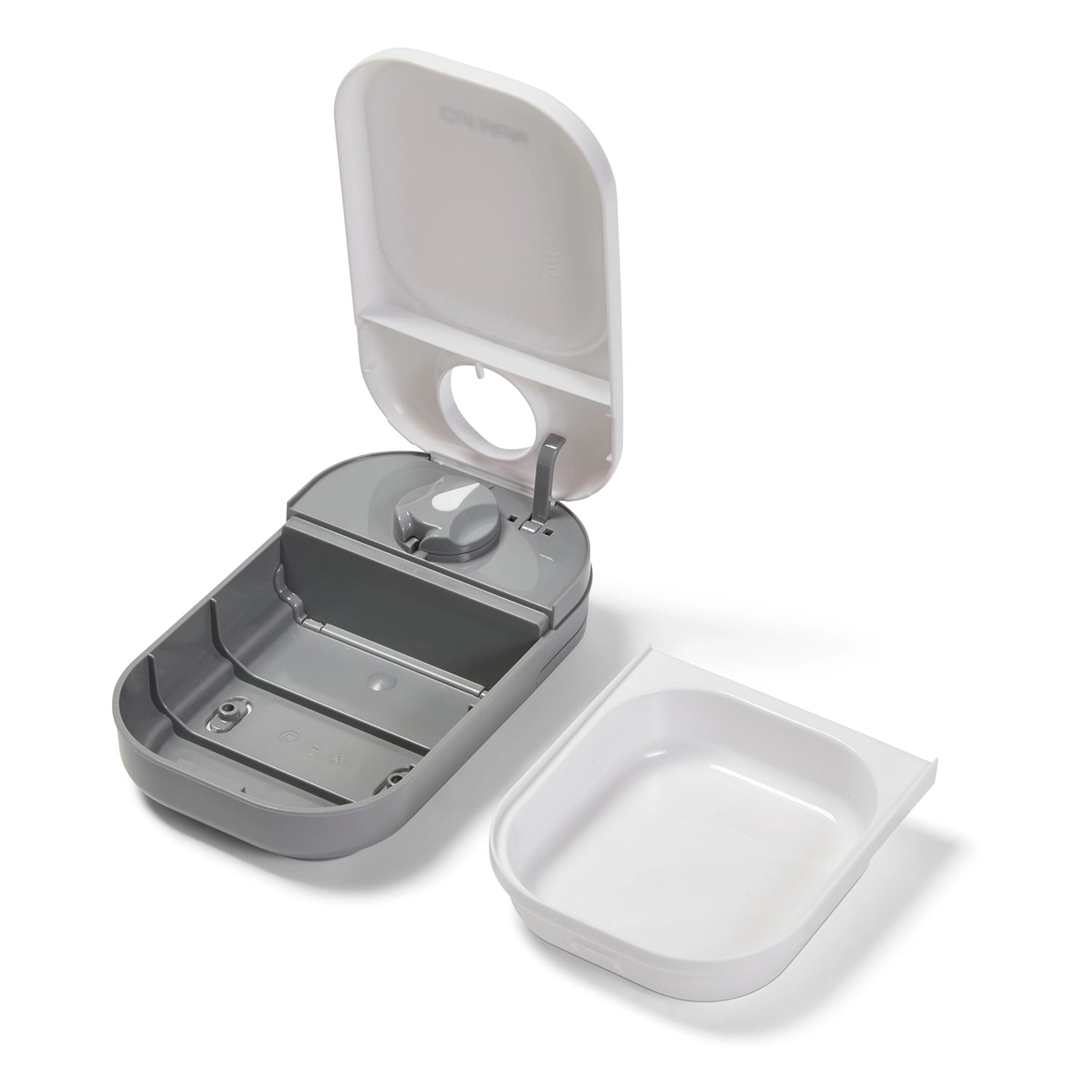 Pet feeder with a white lid on and grey base, situated next to the white food bowl, showing that the bowl can be removed from the base for filling or cleaning purposes, on a white background