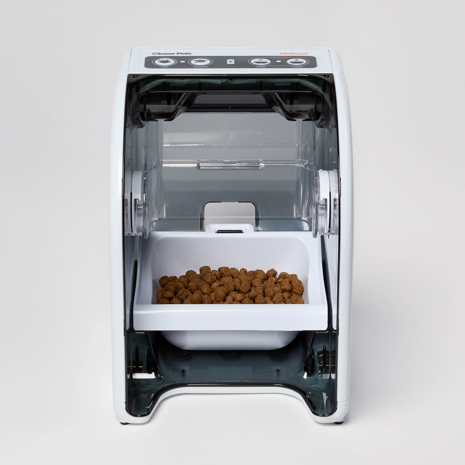A front view of the MiBowl pet feeder with fry food in it