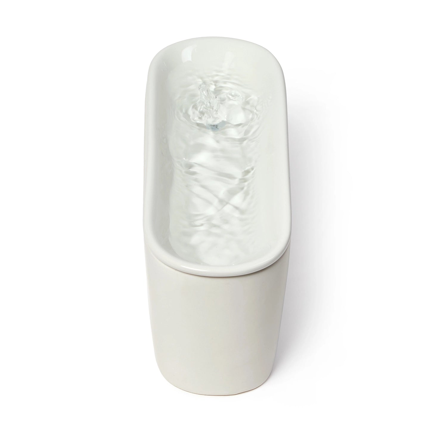 A side view of the light grey ceramic cat water fountain made by Cat Mate on a white background.