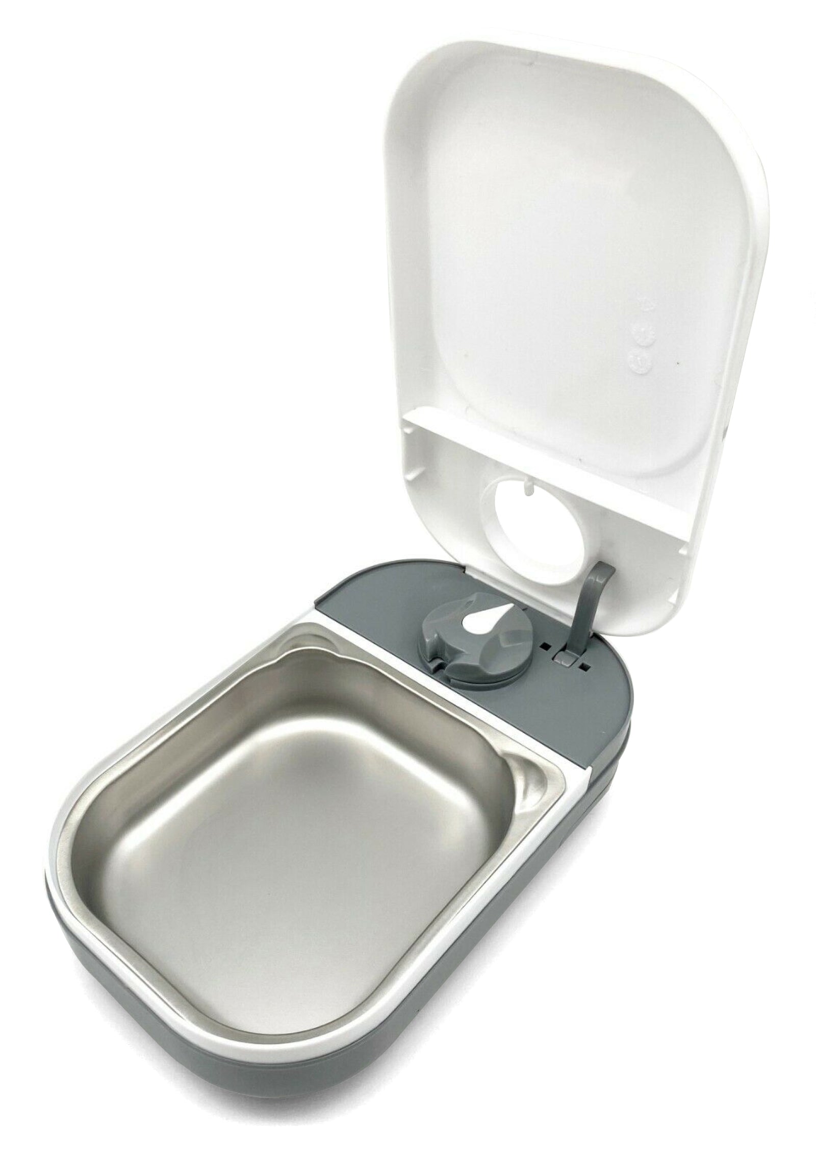 An empty stainless steel bowl that can be used for wet or dry pet food and is suitable for cats or small dogs in a grey and white pet feeder on a white background