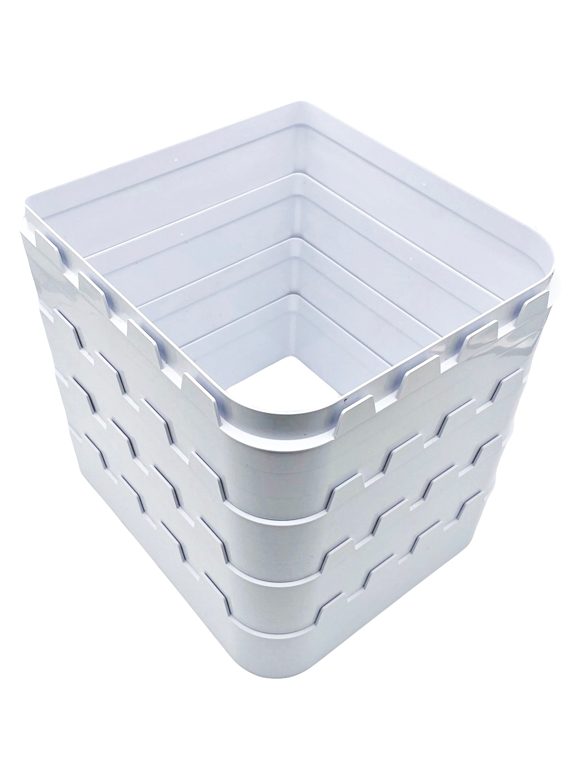 An image of a stack of four wall liners / tunnel sections in white to facilitate the installation of a large cat flap on a clear background