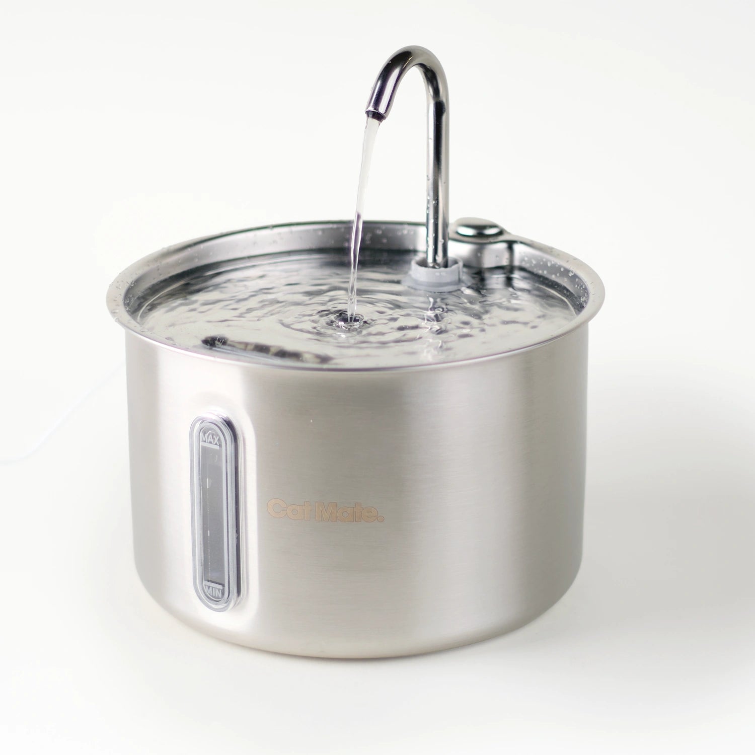 A stainless steel pet water fountain with a curved faucet and water flowing into the bowl, shown on a clean white background. The brand name 'Cat Mate' is visible on the front.