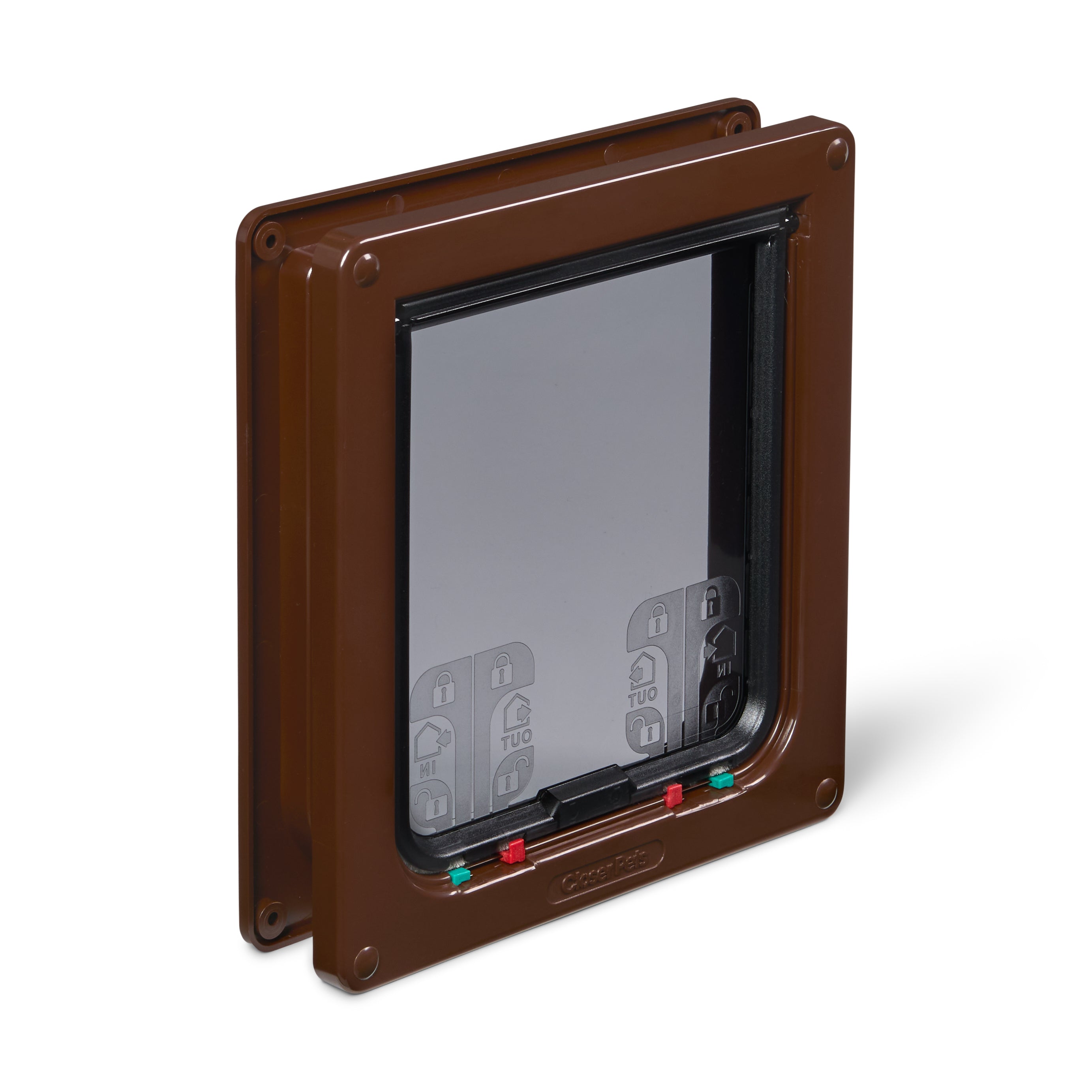 Brown pet door with a clear flap and manual red and green locks on a white background