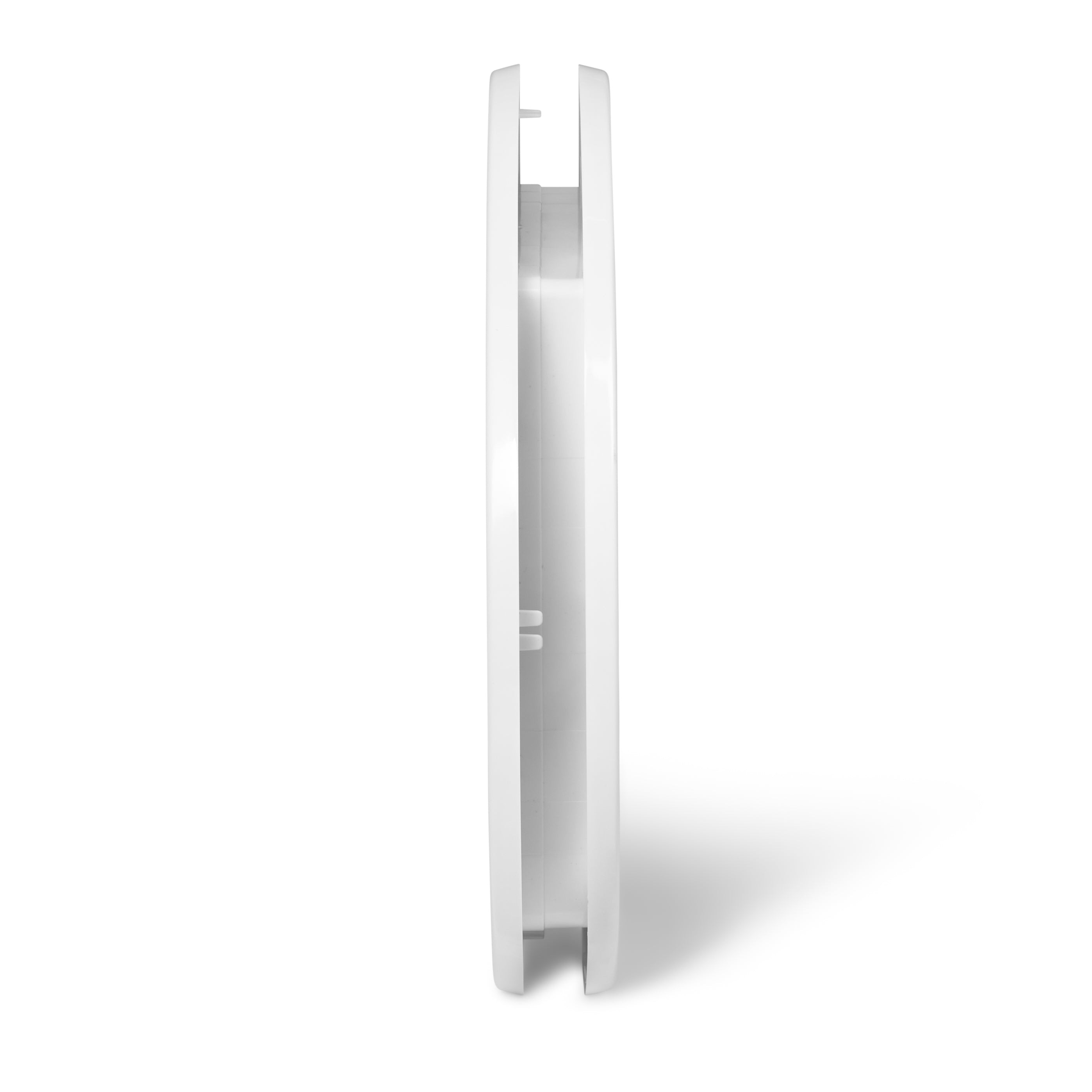 A side on view of the pet flap in white which is self lining up two two inches and is suitable for installation into a variety of door types and walls on a white background 