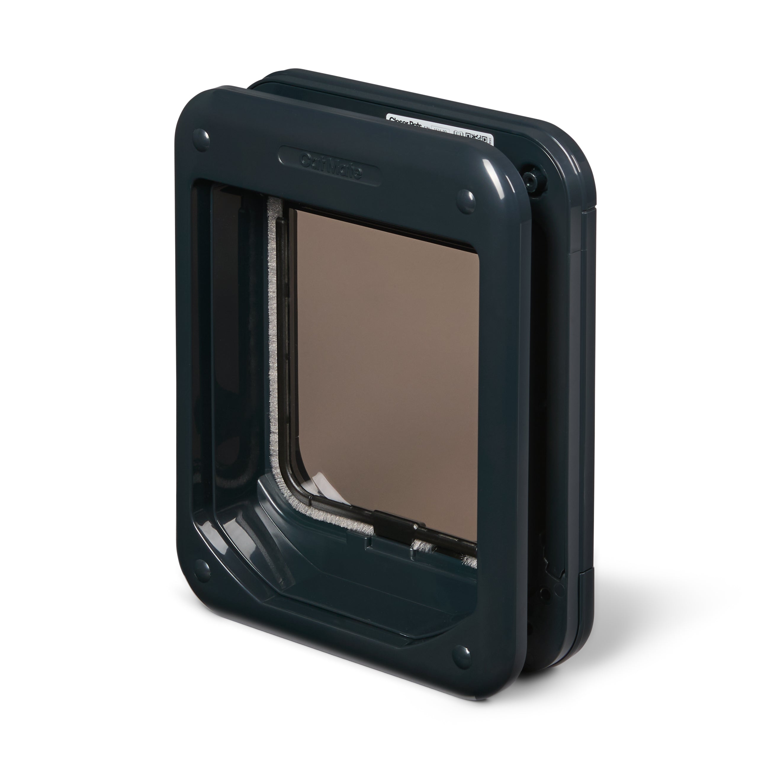 A side-angled view of the grey cat flap, showing the draught-proof and weather-proof brushing as well as the magnetic closure, on a white background 